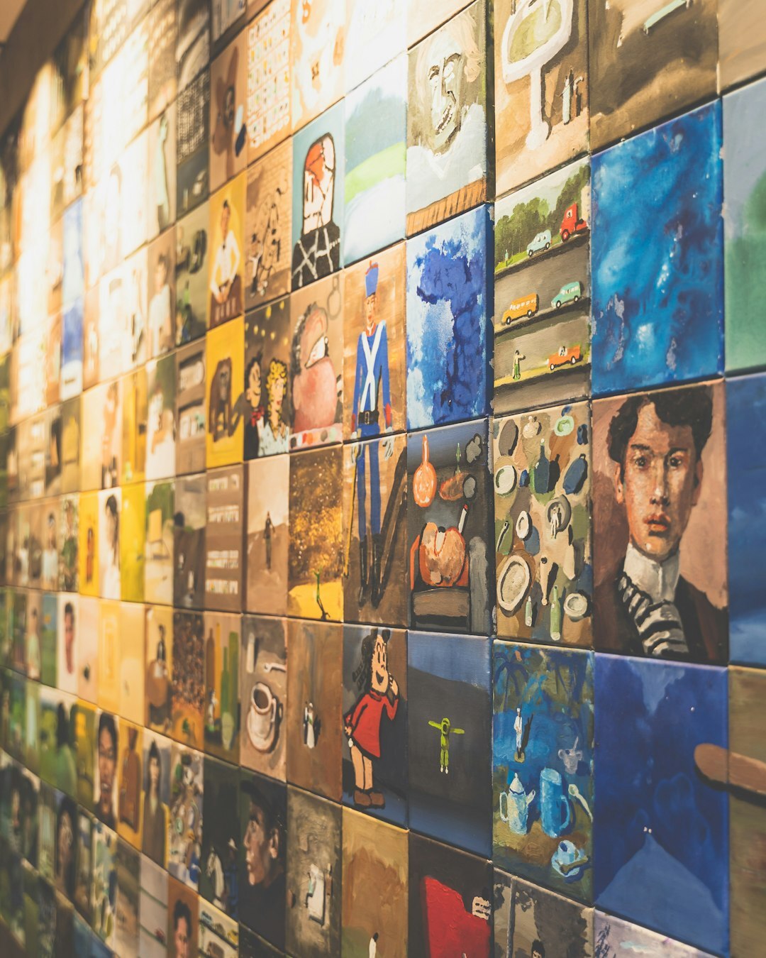 Wall of archival photographs and documents about the history of automobiles in Uruguay