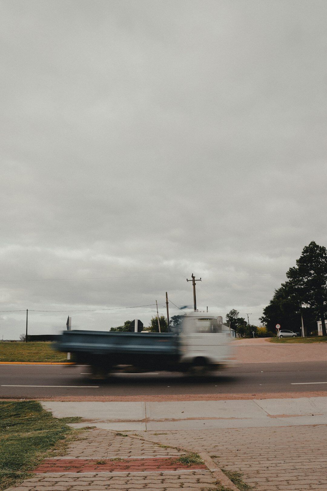 Portrait of a Uruguayan automotive historian and editor writing at a desk