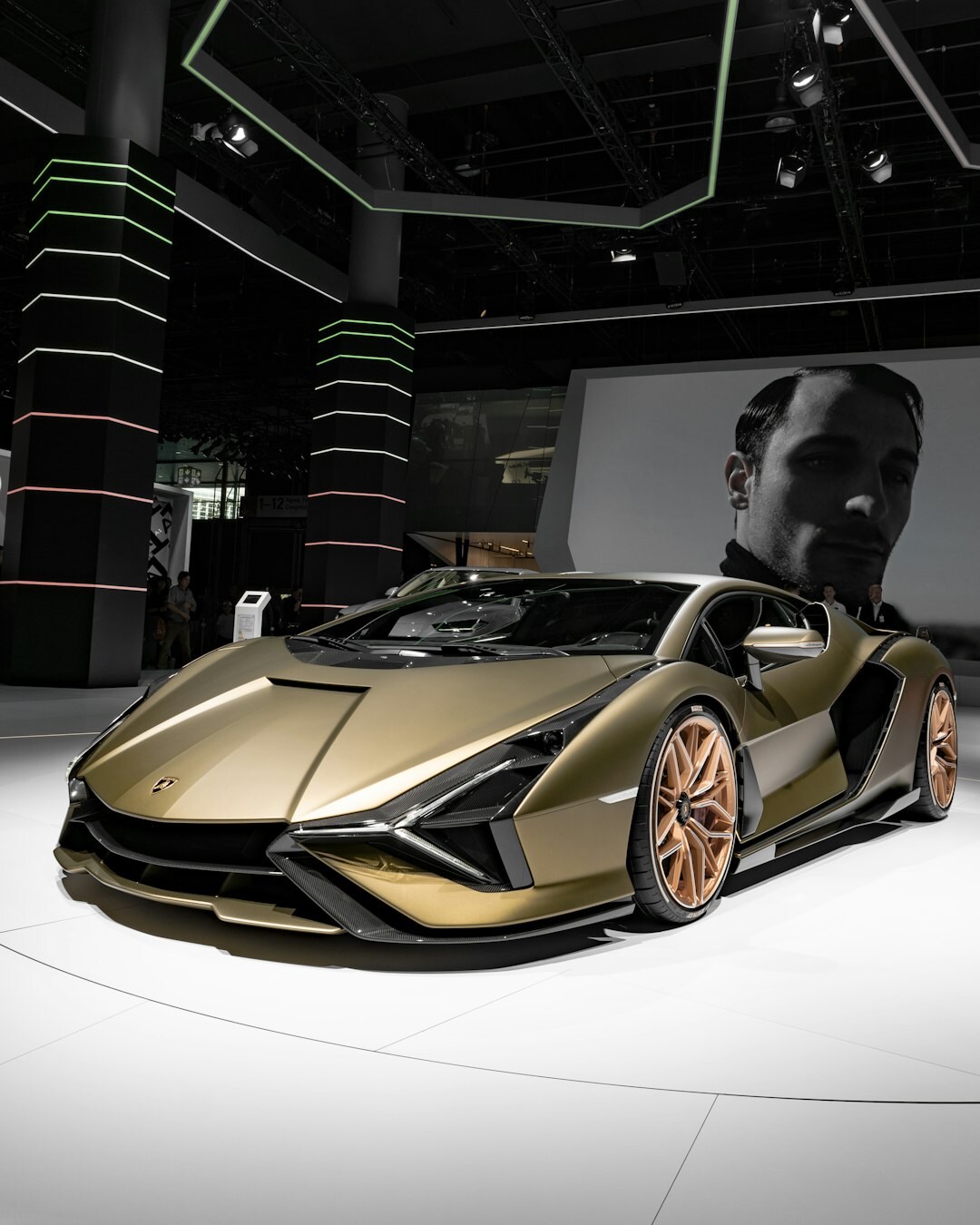 Angular 1980s supercar photographed in a studio setting